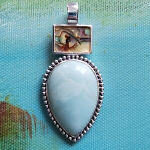 Roman Silver Tone Pendant